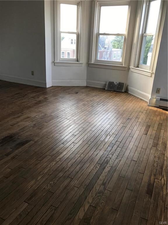 LIVING ROOM THAT FACES THE FRONT OF THE BLDG