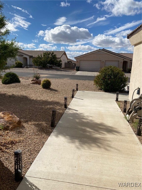View of home's exterior with a garage