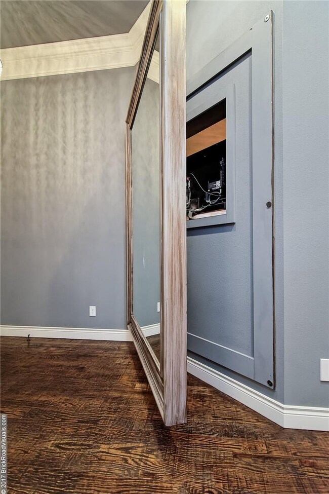 Front entry, hinged mirror opens to access the 