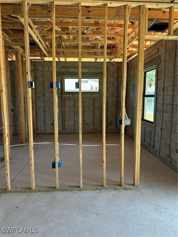 Miscellaneous room featuring concrete floors