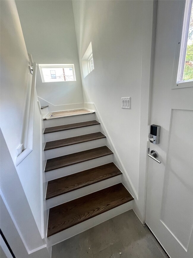 Foyer * Hardwood Floors on the Stairs.