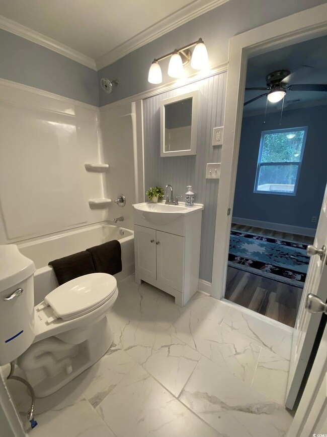 Full bathroom with toilet,  shower combination, ce