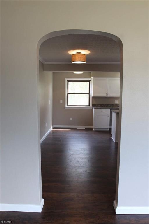 View from the front door into the eat in kitchen.