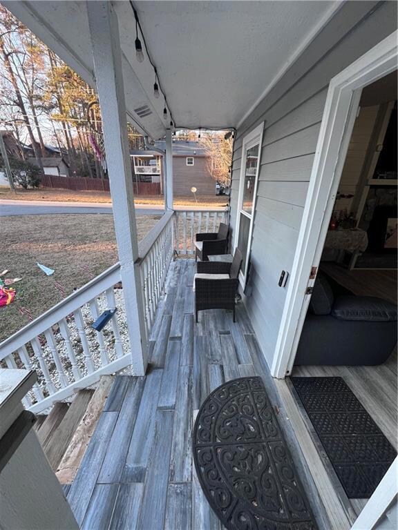 Wooden terrace with a porch