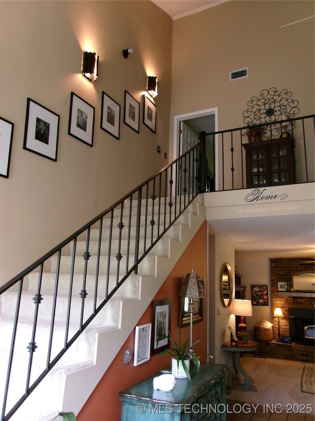 FOYER WITH METAL RAILING AND ACCENT LIGHTING