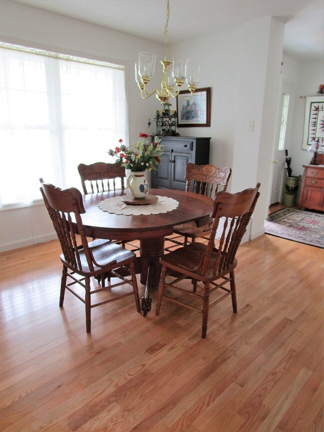 Formal Dining Room with Hardwood Flooring