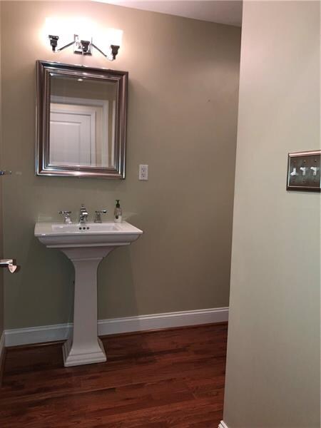 Powder room on the main floor is spacious and plen