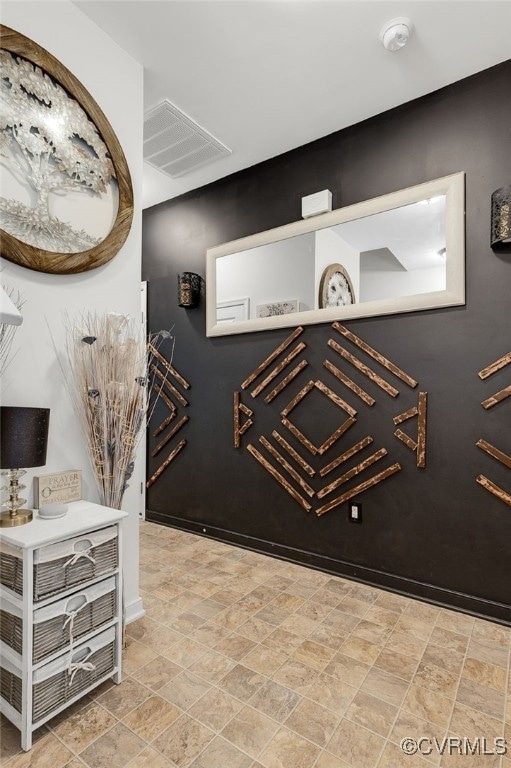 Details with visible vents and baseboards