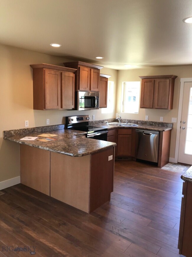 Kitchen. Photo of similar home.