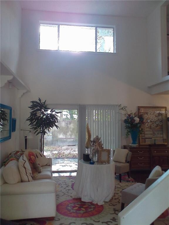 A VIEW OF THE TWO STORY CEILING AS YOU ENTER YOUR 