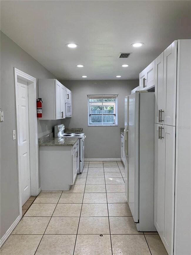 7509 Morning Glory Ln, Tampa, FL 33619 - photo 7