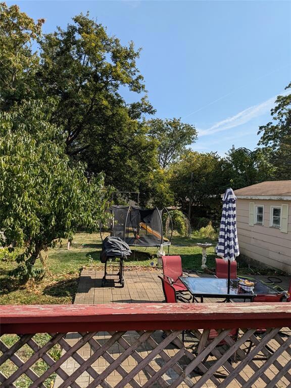 deck overlooking fenced yard