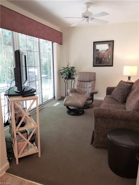 COZY FAMILY ROOM/DEN OFF OF KITCHEN HAS TRIPLE SLI