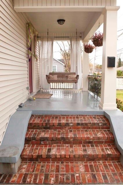 Cozy and inviting front porch.