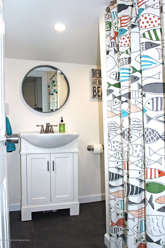 Updated bathroom with stall shower