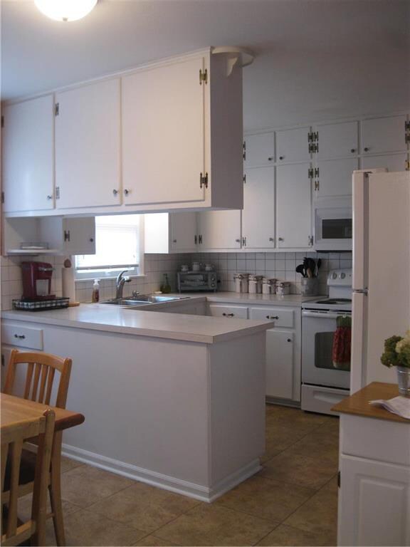 Kitchen with freshly-painted cabinets!