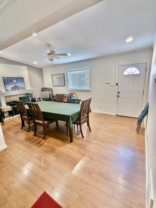 Dining room with ornamental molding, baseboards, 