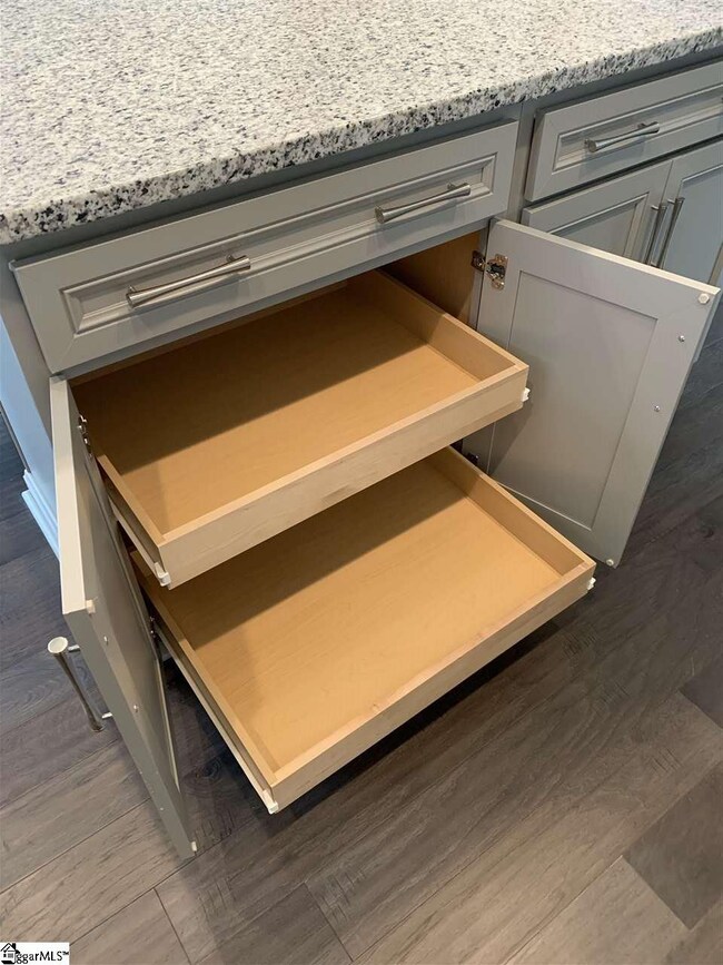 Each lower cabinet set has pull out drawers!