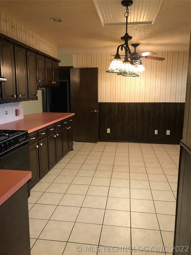 KITCHEN HAS NICE PANTRY AND SPACIOUS CABINETS.