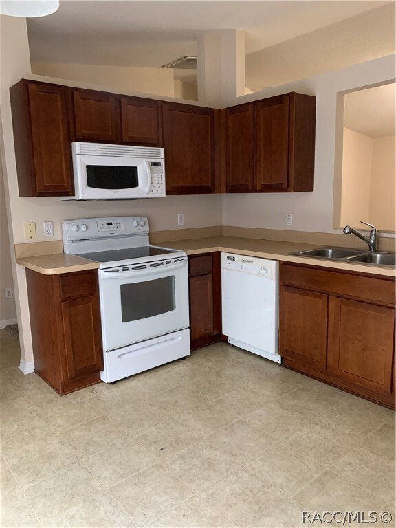 NICE OPEN KITCHEN WITH PASS THRU TO LIVING/DINING AREA