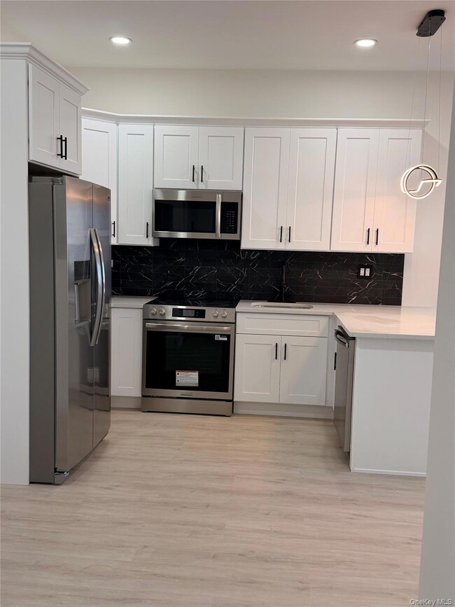 3255 Lawson Blvd unit 201, Oceanside, NY 11572 - photo 2