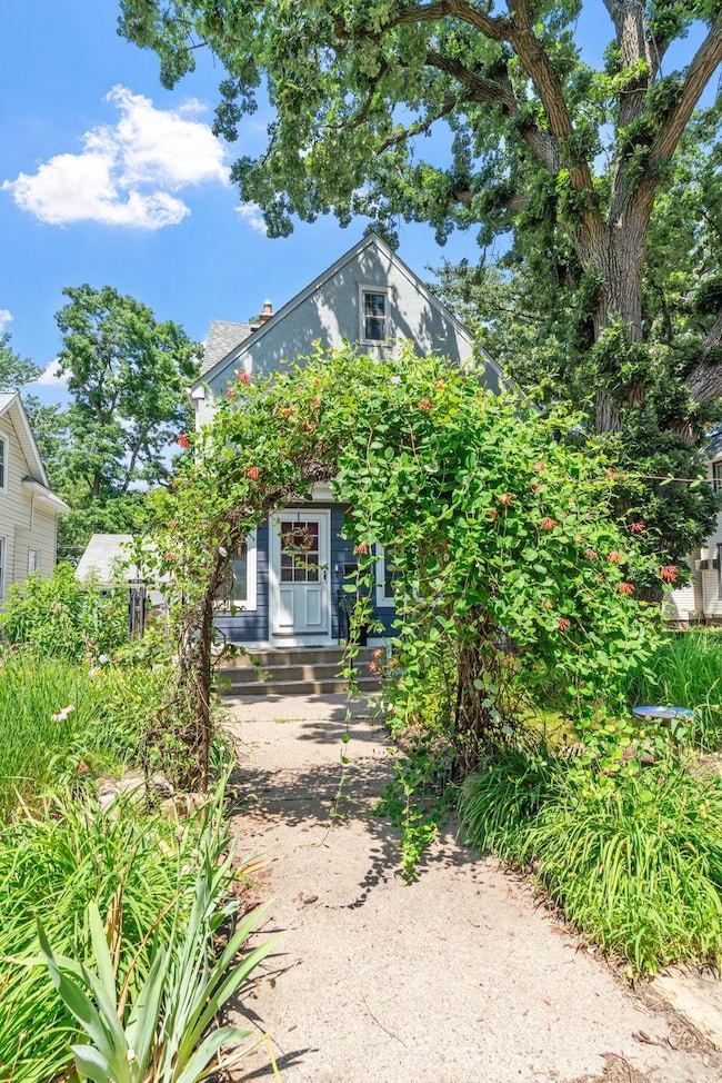 Charming arch in front of home