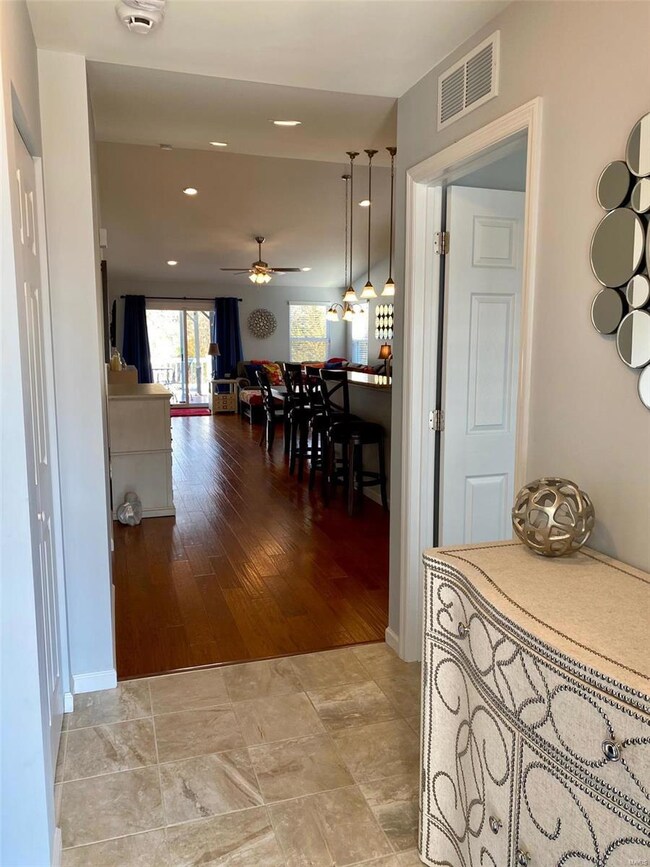 Front entry with ceramic tile.