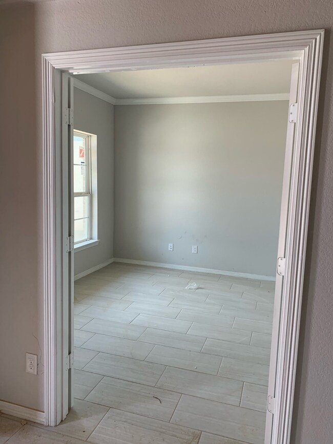 Study on first floor in the front of the home.