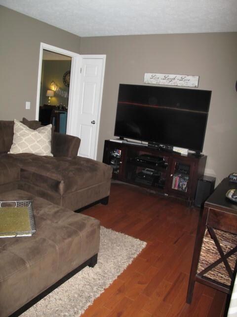 Formal Living Area leading to the center of the home and Kitchen Area