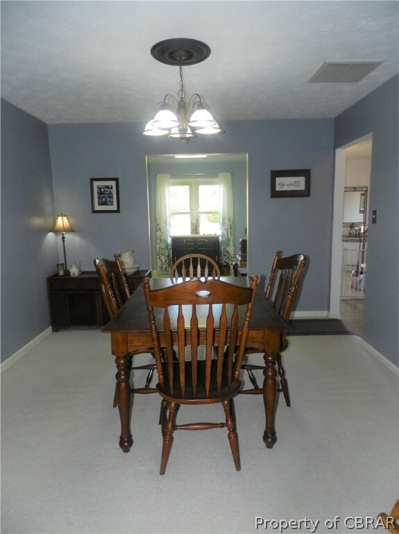 Dining room view toward kitchen