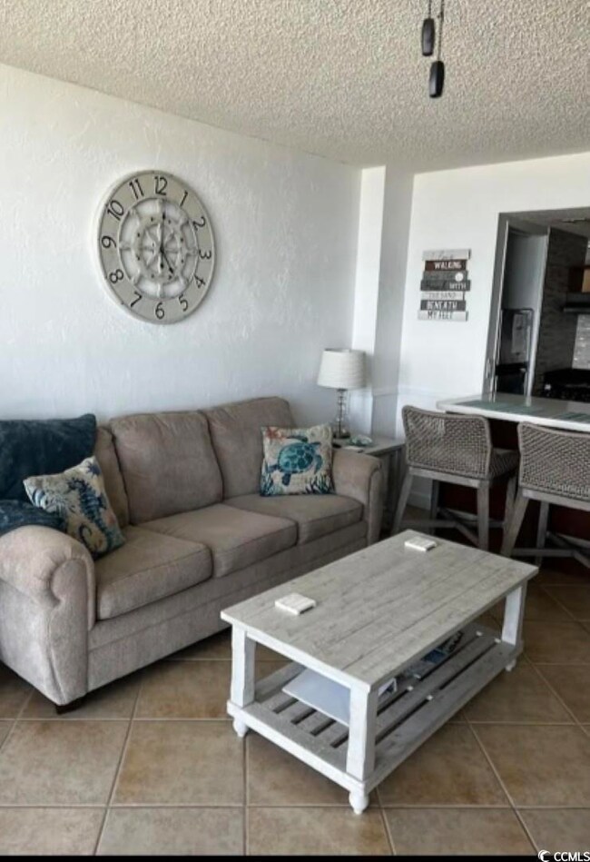 Living room w/oceanfront views