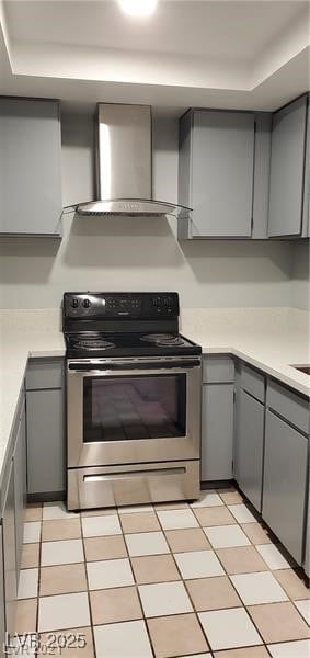 Kitchen featuring gray cabinets, stainless steel r