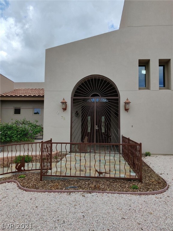 Main House Entrance with exceptional ironwork gate