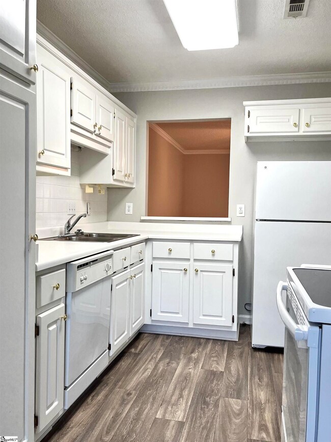 Refrigerator & Stove stays with townhouse.