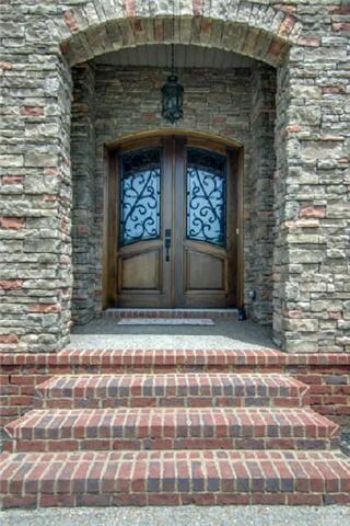 Stunning Stone Entry To Your Covered Front Porch