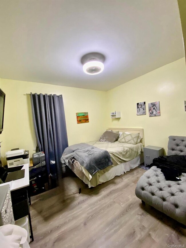 Bedroom featuring wood finished floors