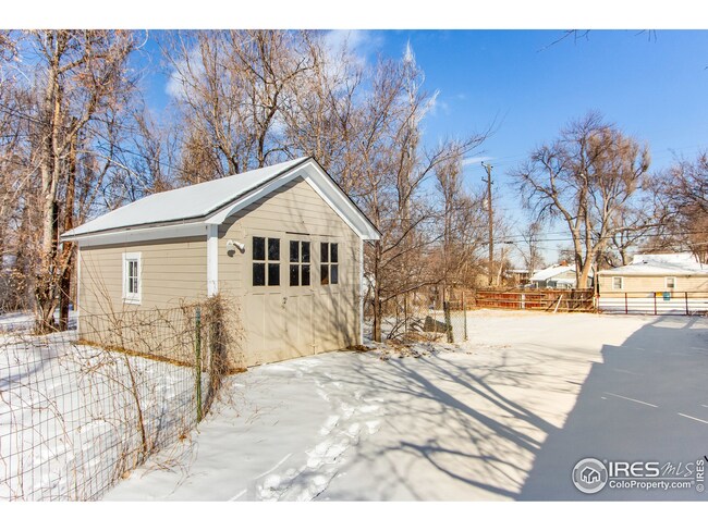 Alley Loaded gated lot with a great lil one car.