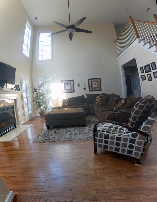 Airy Living Room with 18' Ceiling