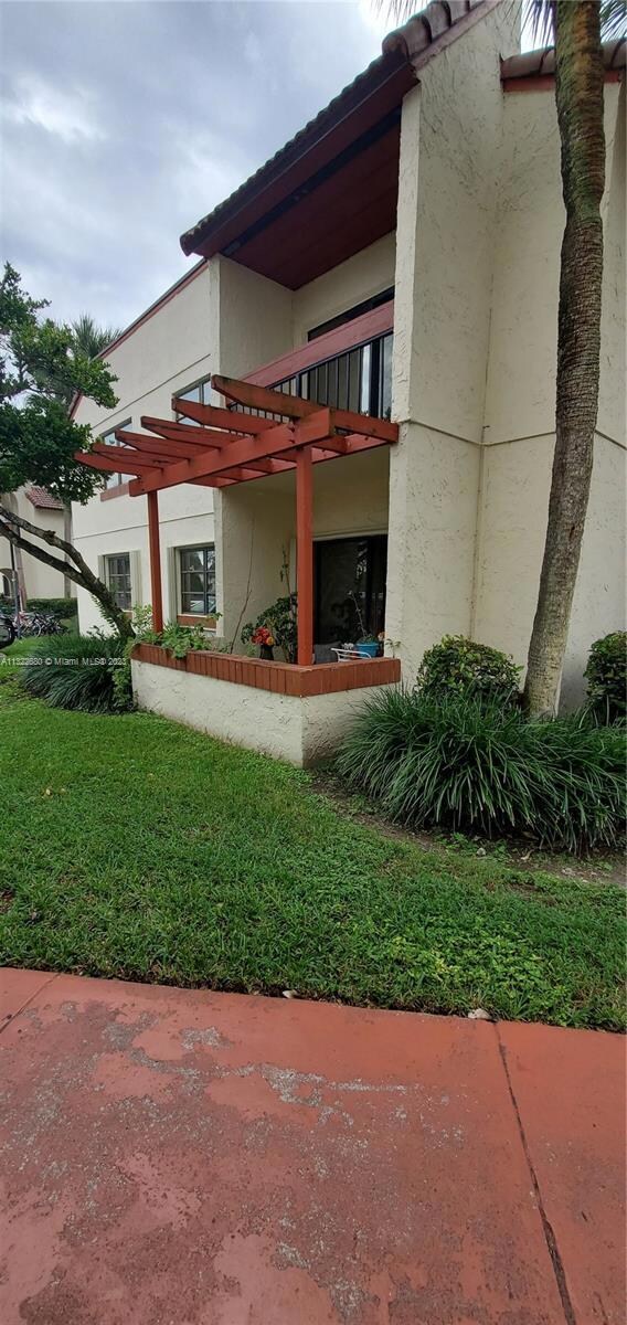 1st Floor Condo w/Accordion Shutters
