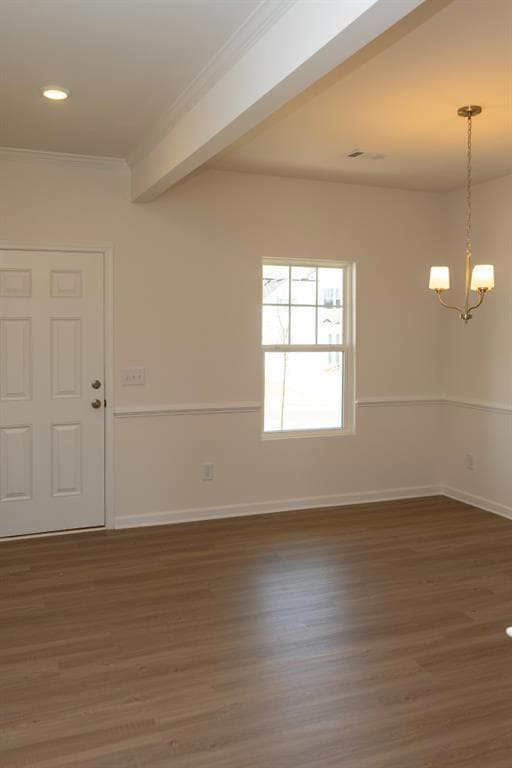 Unfurnished room with ornamental molding, baseboar