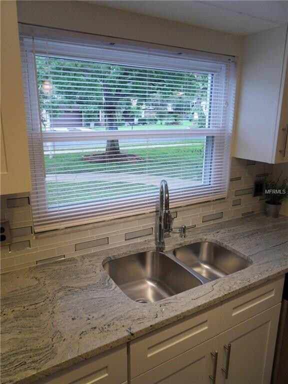Kitchen with Quiet view to front yard