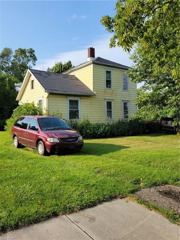 View of front of home with a front yard