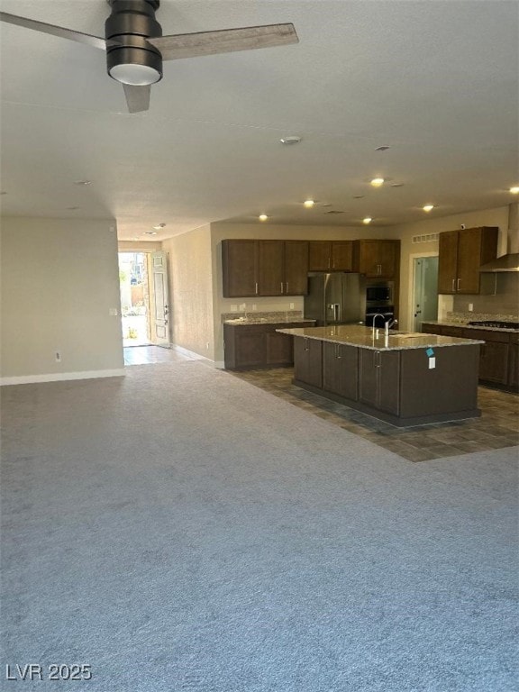 Kitchen with stainless steel fridge with ice dispe