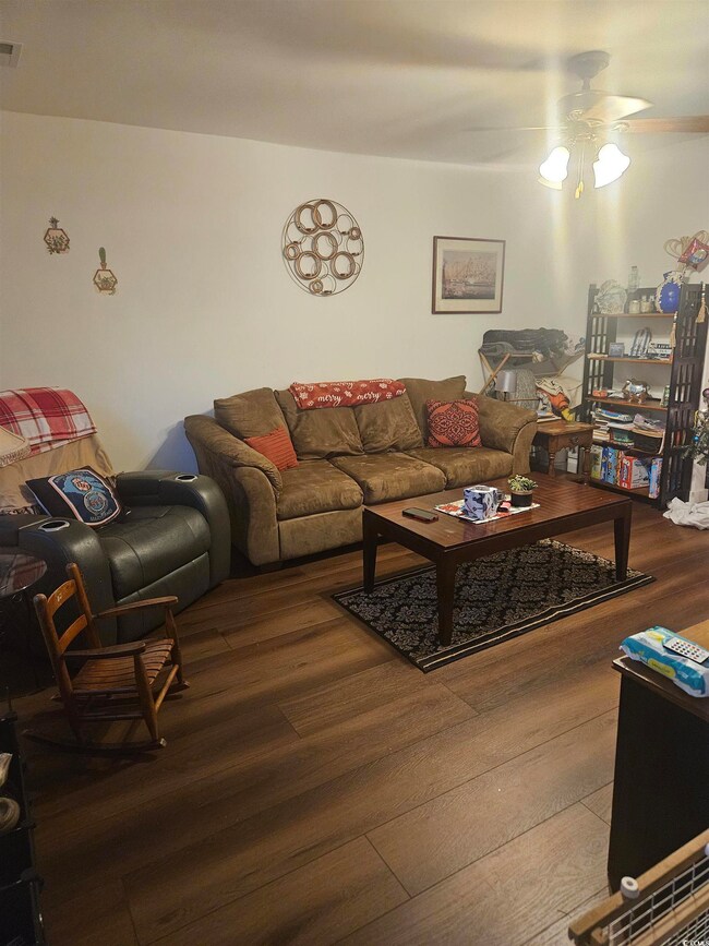 Living room featuring hardwood / wood-style floors