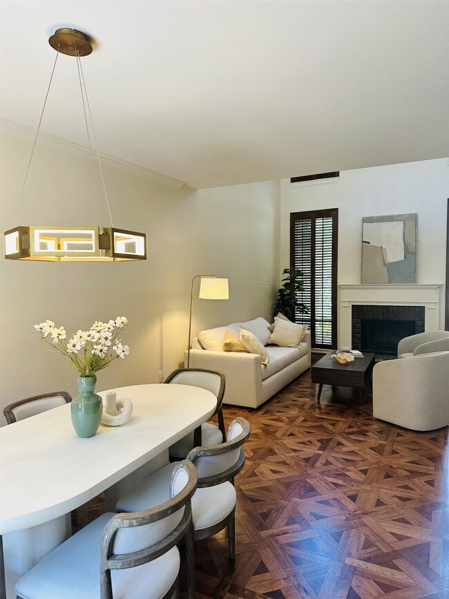 Bright open-concept layout connects the elegant di
