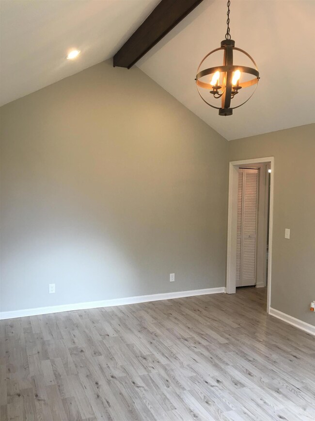 Living Room with doorway to Hall leading to the 2nd and 3rd Bedrooms