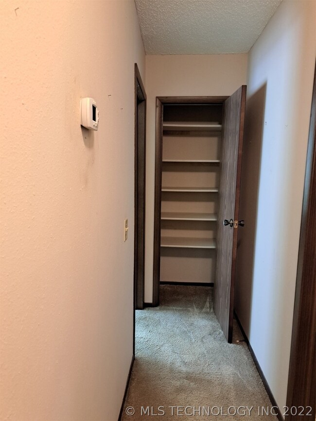 Linen Closet at end of hall