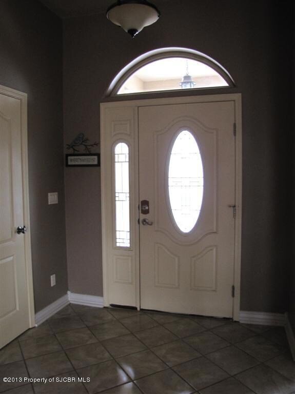 Foyer area with coat closet