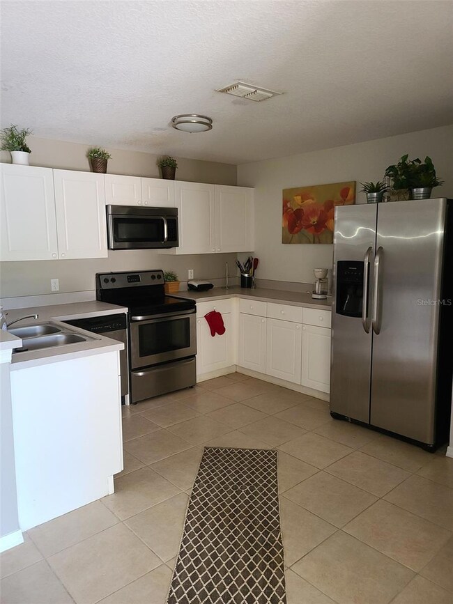 8840 Grand Palms Cir unit A, Kissimmee, FL 34747 - photo 5