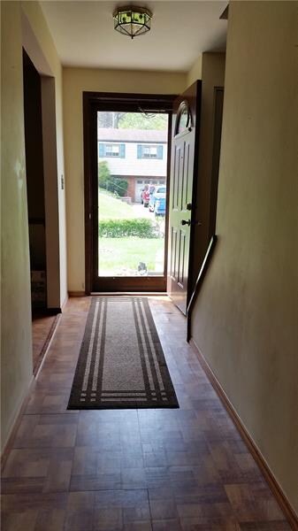 bright and large entrance way, leads to living roo